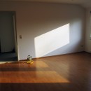 Wohnung 4 - Wohn-/Esszimmer mit Blick Richtung Flur